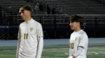 A pair of Warriors prepare for game.