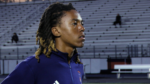 A Naperville North boys soccer player looks on in warmups.