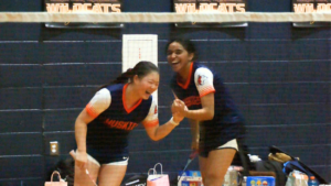 Allison Li celebrates a tough point with her teammate.