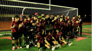 East Aurora boys soccer celebrates sectional titel win.