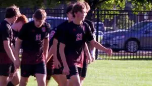 Evan Doy walks around following goal against Marmion.