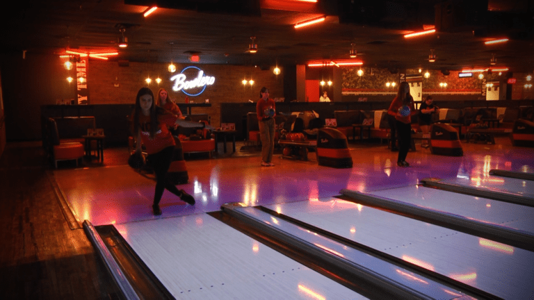 women's bowling team practicing