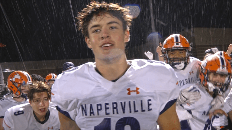 Naperville North football celebrating during interviews