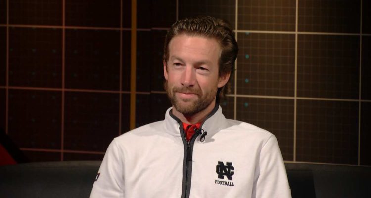 Brad Spencer in a white North Central football quarter-zip