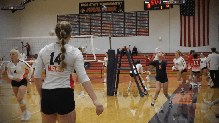 Naperville North girls volleyball warms up