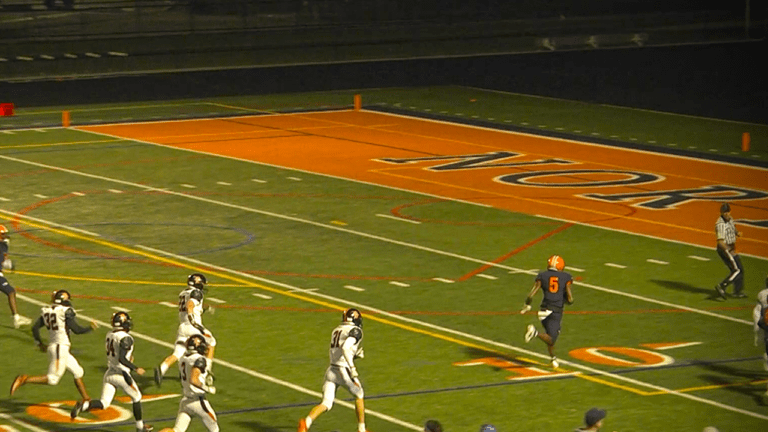 Luke Williams running for the touchdown