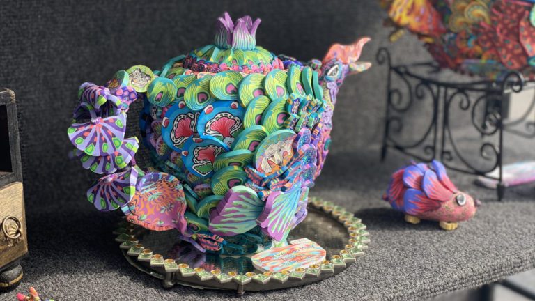 artistic teapot on display at Riverwalk Fine Art Fair