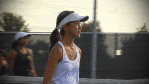 Sophia Chiou walking onto the court