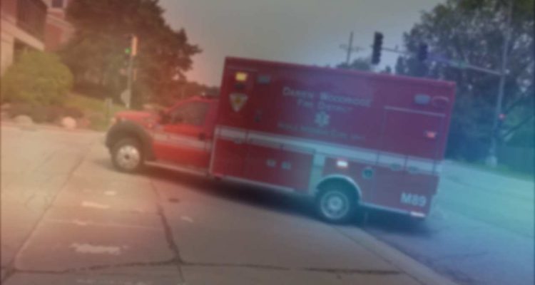 File image of Ambulance with red and blue blurred police lights