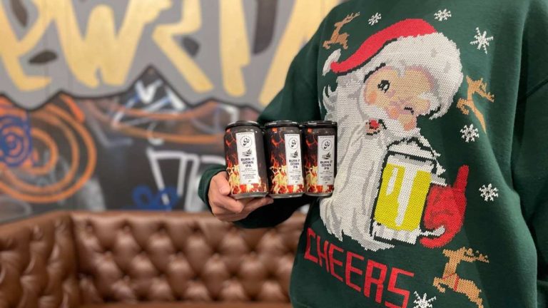 Holidays to Remember-Beer & Person in Santa shirt at Go Brewing