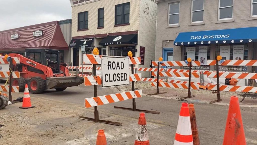 Construction signs, road closed sign in downtown Naperville during streetscape imrpovement work
