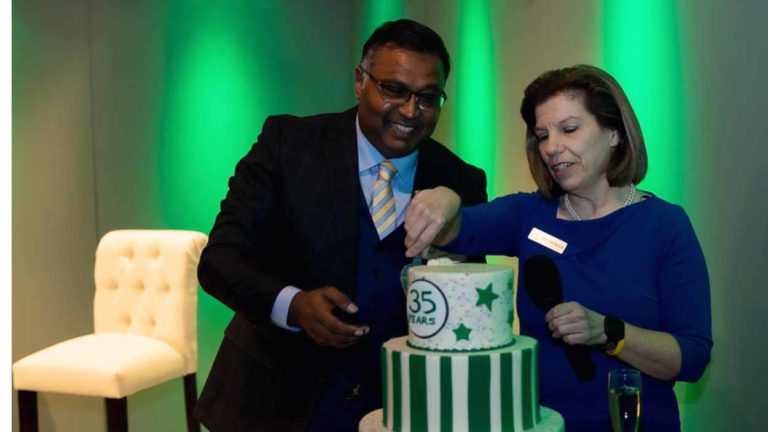 Liz Spencer and Kader Sakkaria cut the NCTV17 35th Anniversary Cake
