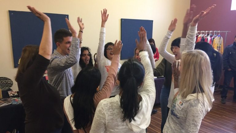 Alive Center helps teens embrace who they really are. Teens high five.