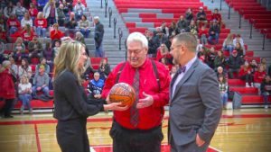 Coach Andy Nussbaum honored with ball for 700th win