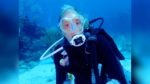 Jackie Gill underwater scuba diving.