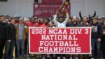 North Central College football team with National Championship banner