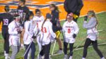 Eloise Malley celebrating with teammates