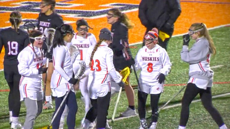Eloise Malley celebrating with teammates