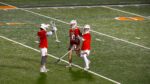 Thomas Tierney getting hugged by his teammates