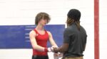 Redbirds Gymnast talks to coach
