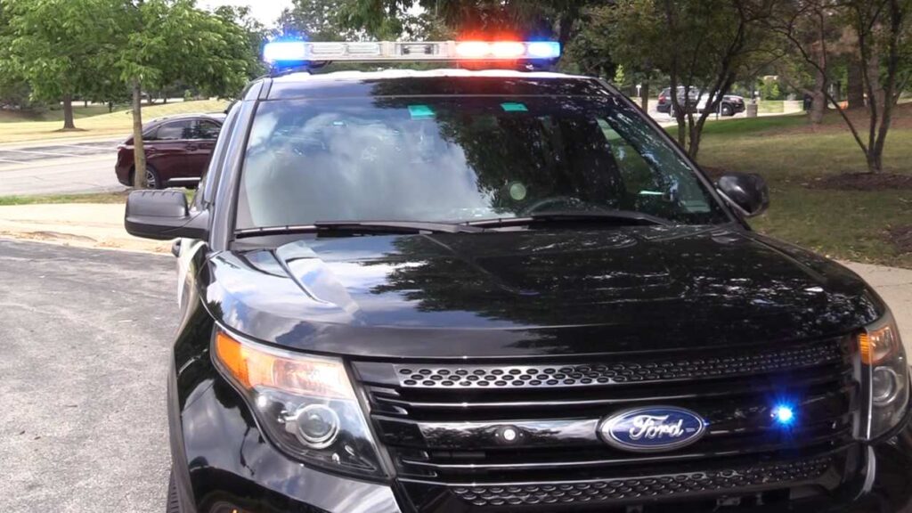 File image of Naperville police car exterior with lights on