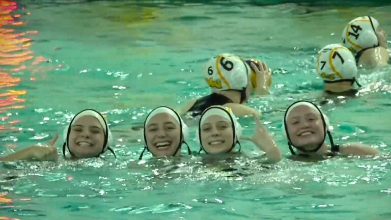 Allie Leslie posing with teammates