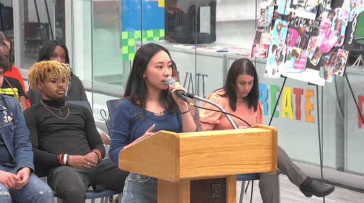 District 203 student on the Student Advisory Council speaks at meeting