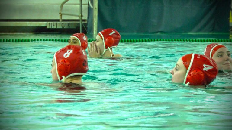 Naperville Central in the pool warming up