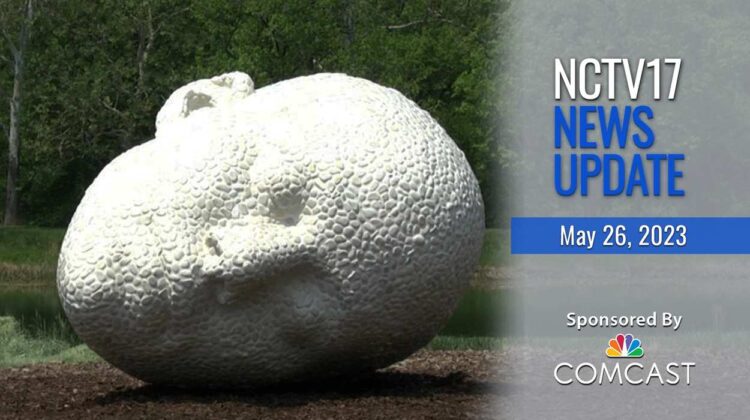 NCTV17 news update slate for 05-26-23, with one of the 'Of the Earth' sculptures at Morton Arboretum - a giant head.