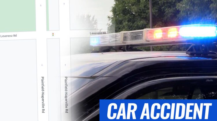 Police car lights with car accident written on slate