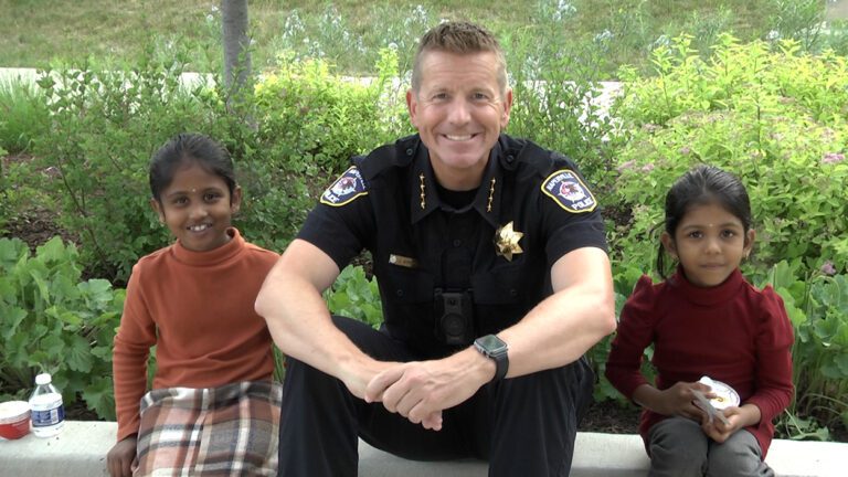Naperville police chief Arres sitting with kids