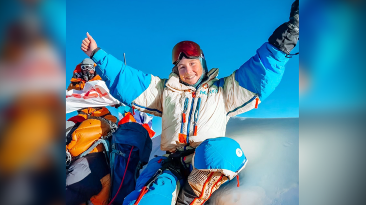 Lucy Westlake, atop a mountain