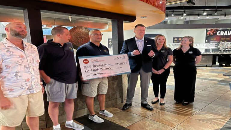 BD's Mongolian Grill check presentation for autism research