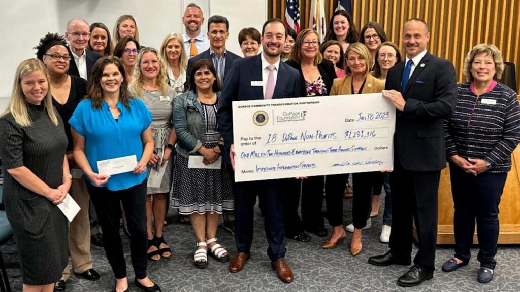 The DuPage County Board and DuPage Foundation with the check.