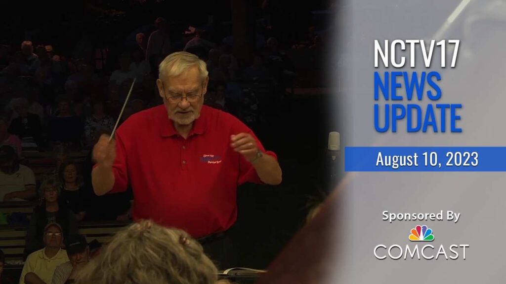 NCTV17 News Update slate with Ron Keller directing band in background