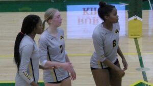 Metea Valley girls volleyball players in between points during set two against Waubonsie Valley.