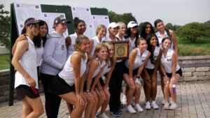 Neuqua Valley girls golf poses with the DVC championship plaque