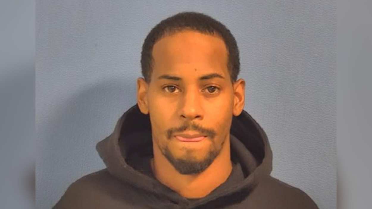 Convicted felon on parole accused of robbing two local banks at ...