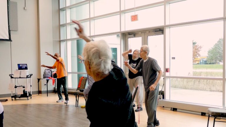 group of seniors participate in neuro flex fitness class