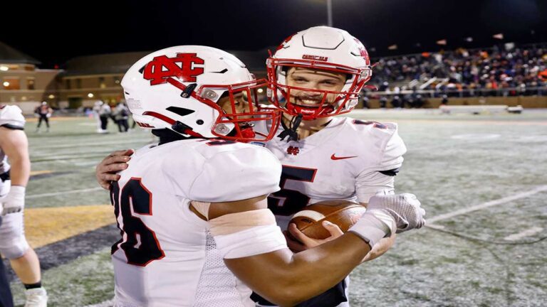North Central College football celebrates 34-27 semifinal win over Wartburg