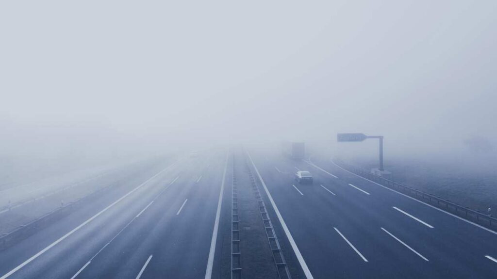 dense fog covering highway