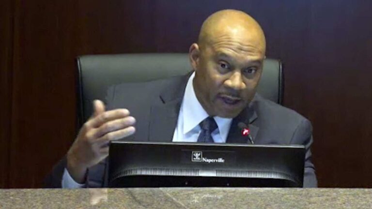 Naperville City Councilman Benny White at Tuesday's meeting. He was allocation toward the Career & Networking Center