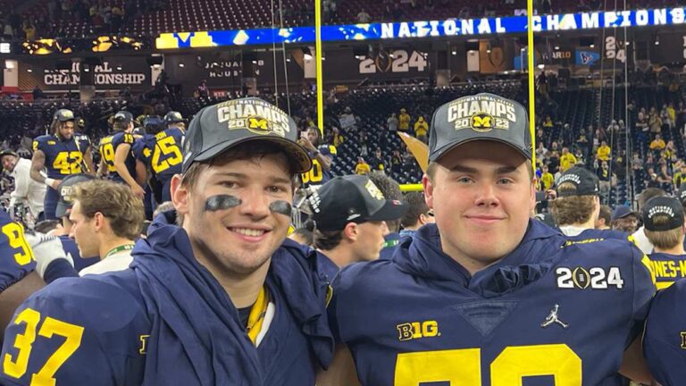 Naperville natives Danny Hughes and John Weidenbach celebrate after being National Champions with Michigan
