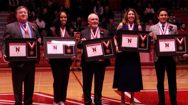 Nicky Lopez and the rest of the Naperville Central 2024 Athletics Hall of Fame class pose for a photo