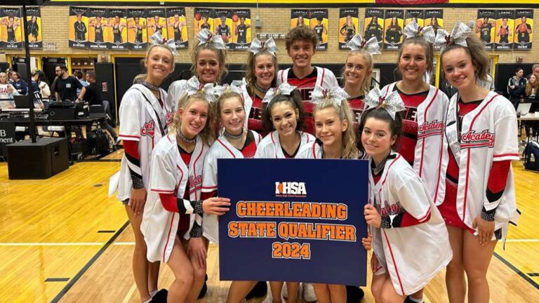 Benet Academy cheerleading poses for a photo