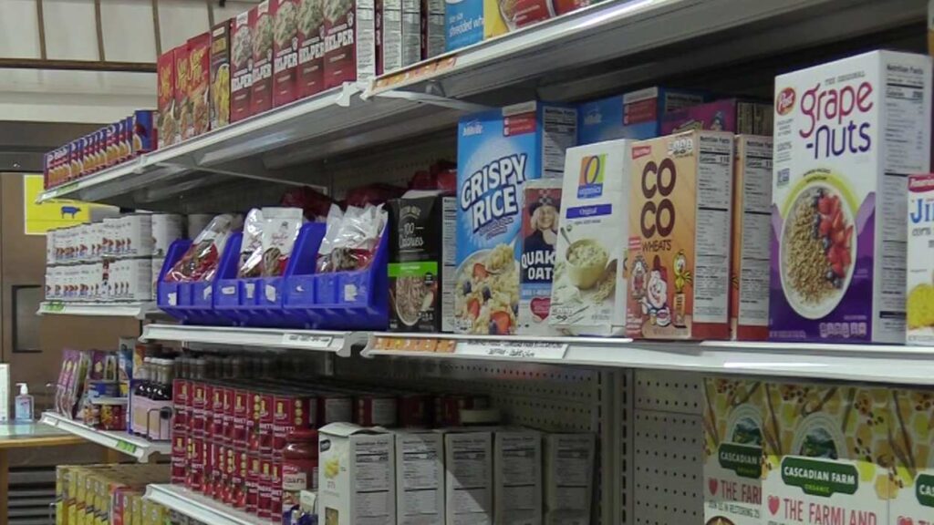 Shelf of packaged food goods at local food pantry