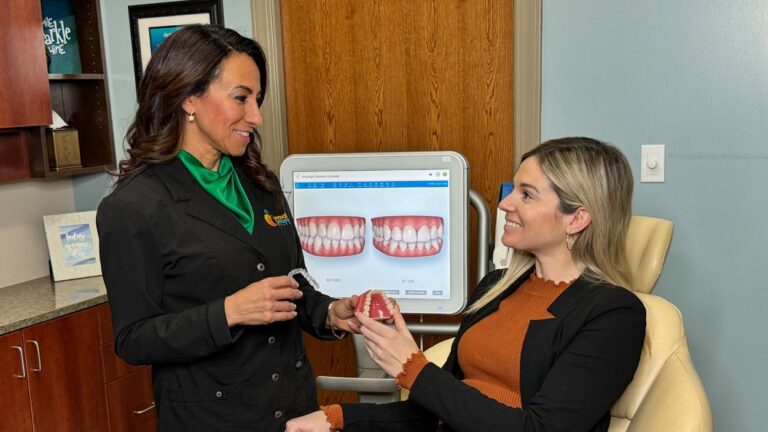 Dr. Manal Ibrahim of Innovative Orthodontic Centers talks to staff member