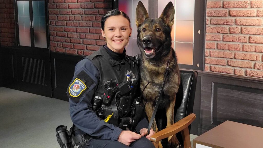 Officer Alexis Hammer and her partner Dax a German Shepherd