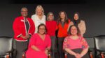 Naperville Women's History month panelists smile for picture in North Central College's Madden Theater