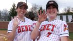 Benet softball players wave at the camera before taking on Waubonsie